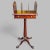 This Late 19th-century bookstand is made of lush mahogany wood and features a central column that smoothly rises to...