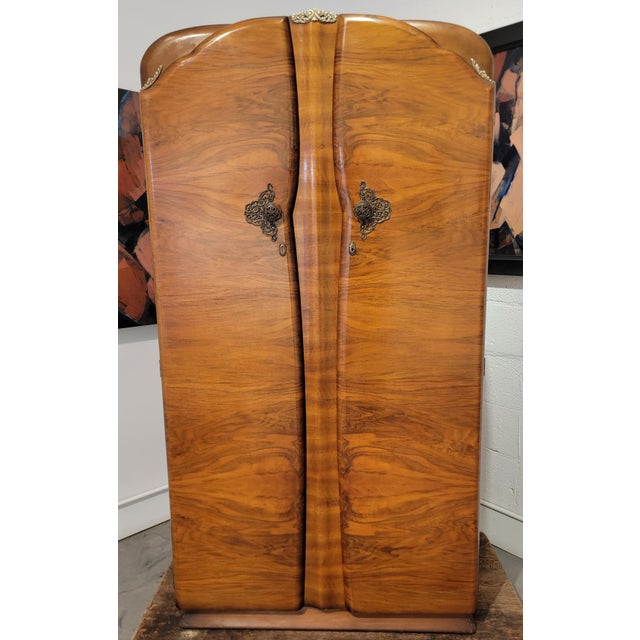Beautiful Burl-Walnut 2 door fitted wardrobe / Armoire in the Art Deco style. Made by "Supersuite" London, England. Circa....