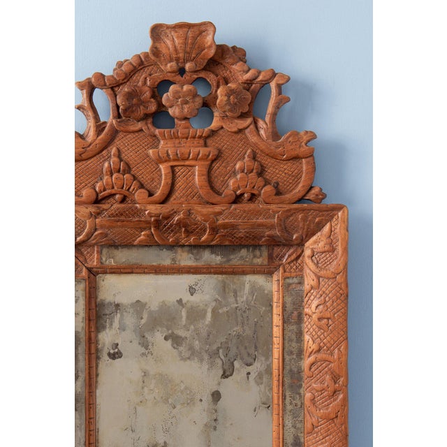 Height: 61 cm Width: 36 cm Light wear, commensurate with age. Original mercury mirror plates and backing.