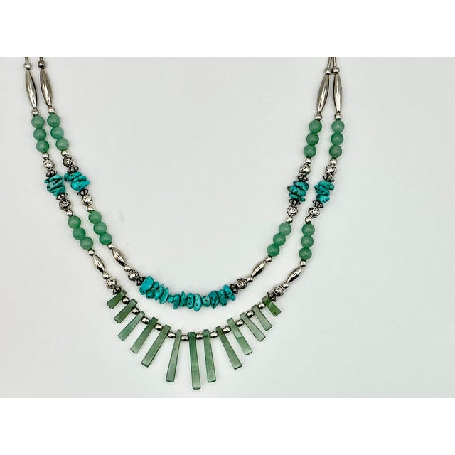 A lovely Double Strand Beaded 24” Necklace. It features 24 Jade Beads, 13 Jade Bars, 25 Turquoise Rocks and Sterling...