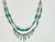 A lovely Double Strand Beaded 24” Necklace. It features 24 Jade Beads, 13 Jade Bars, 25 Turquoise Rocks and Sterling...
