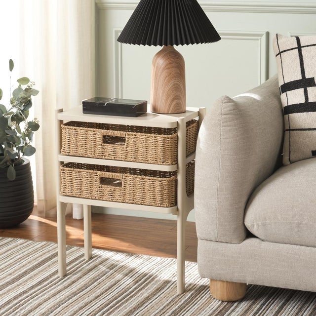 Introducing the Rozalyn Two Drawer Accent Table in a sophisticated Sand hue. This elegantly designed piece offers both...