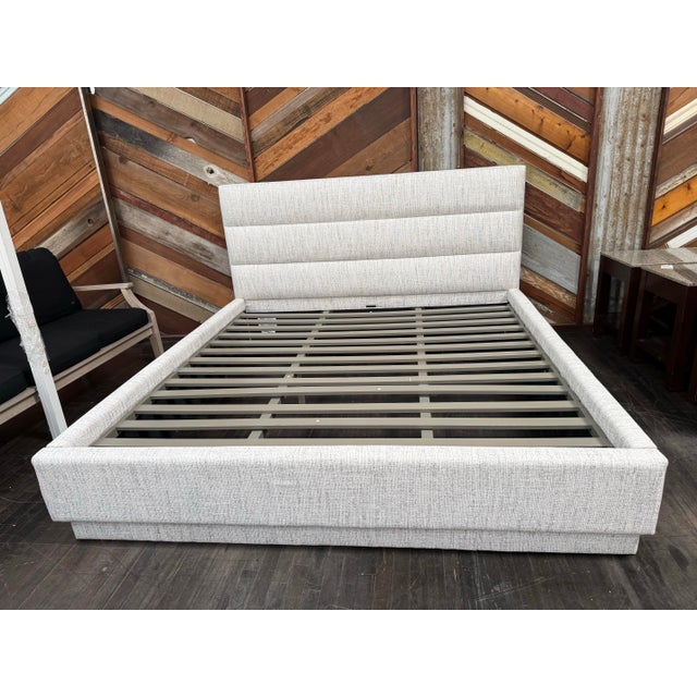 Design Plus Gallery presents the Eastern King Size Channel Bed Frame from Interlude Home. This contemporary upholstered...