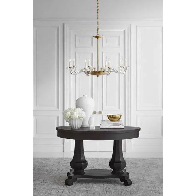 The Brigitte by Paloma Contreras evokes old-world charm in refined sconces and a chandelier. Graceful, elegantly curved...