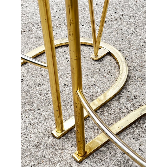 1970s minimalist gold-plated chrome bar stools, set of three. The chrome shows spotting, scratches and areas of color...
