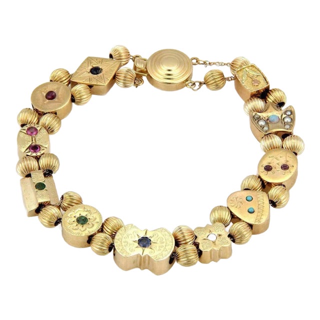 Late 20th Century Multi-Color Gems 14k Yellow Gold 11 Slide Charms Bracelet For Sale