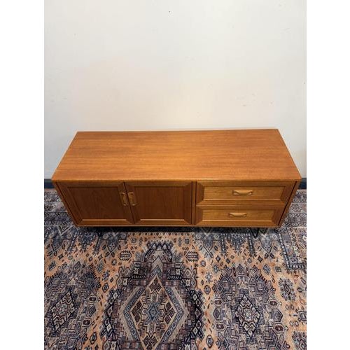 A beautifully designed g plan fresco media unit, showcasing the timeless elegance of mid-century british design. Crafted...