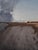 Stroll at Sunset by Mo Myra | Watercolor on paper landscape with a path by the water at sunset For Sale