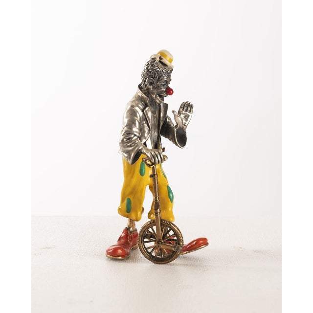 Original pair of decorative figures crafted in enameled sterling silver by the Italian firm Sorini, produced in Arezzo...