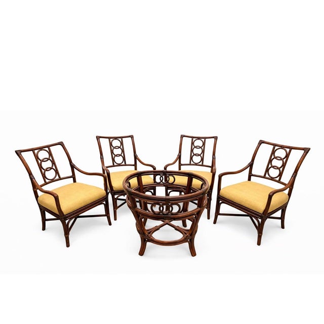 Fantastic dining set Island style of rattan & bamboo very sturdy and only used for staging, minimal wear from storages....