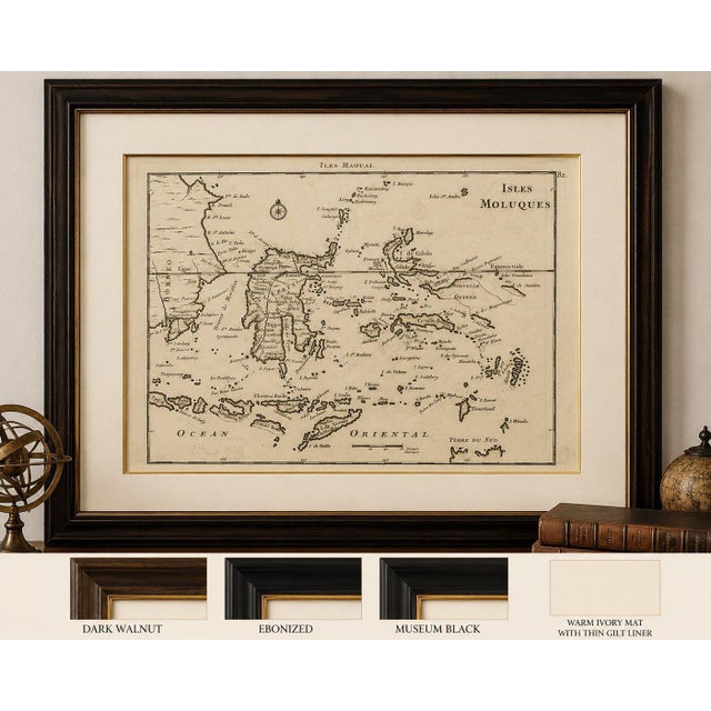 This attractive eighteenth-century map titled Isles Moluques depicts the legendary Spice Islands of Southeast Asia,...