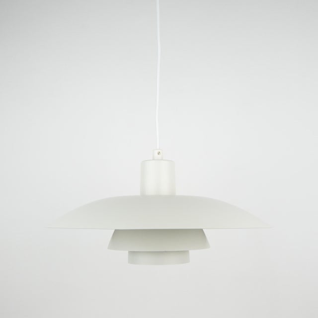 The ph 4/3 lamp is an absolute classic, designed by the renowned danish designer and architect poul henningsen. It has...