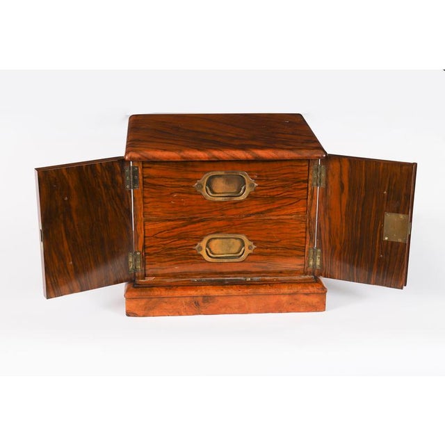 This is a stylish antique Victorian burr walnut table top cigar humidor or collectors table-top cabinet, Circa 1870 in...