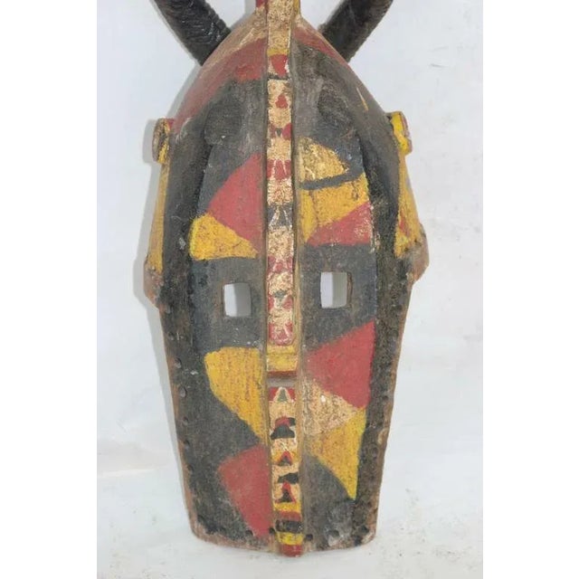 Powerful Primitive Tall African Wood Carved Polychromed Mask For Sale - Image 4 of 8
