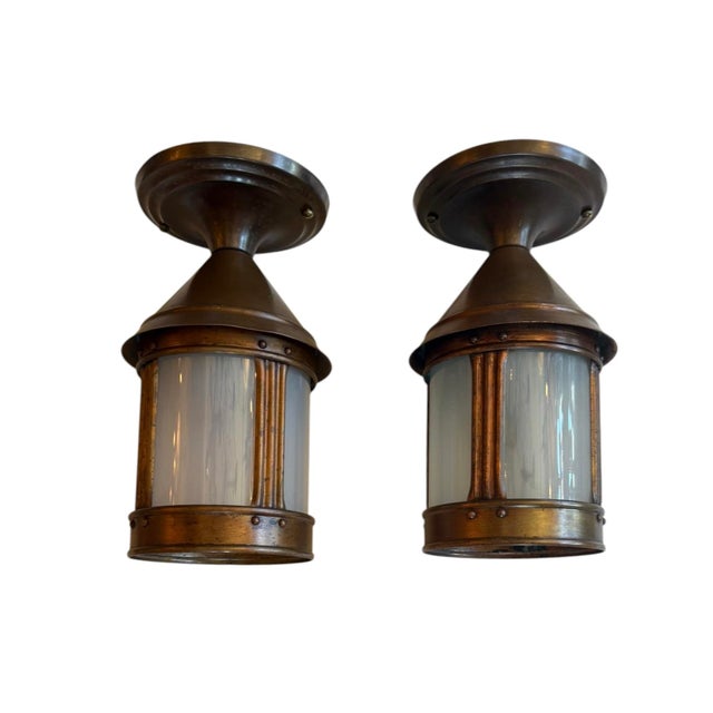 These will look great outdoors or indoors. Original brass lanterns with genuine cylindrical art glass. Such a great pair...