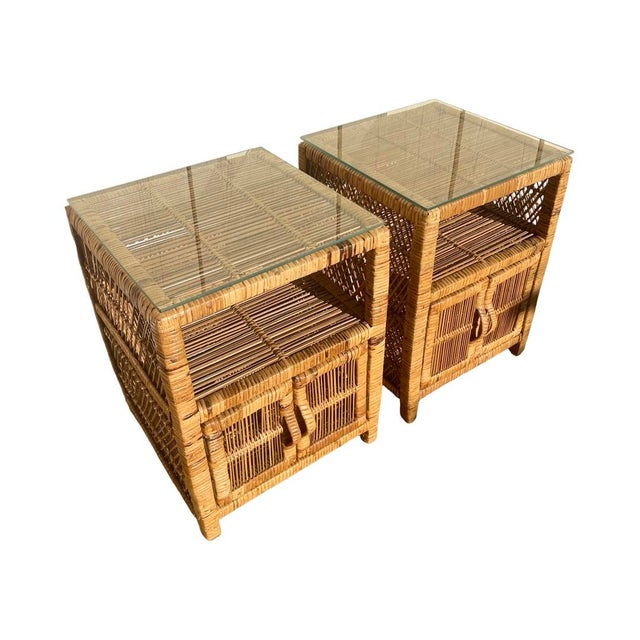 Vintage petite coastal rattan wrapped and wicker nighstands with glass top. Tables are in excellent vintage condition with...