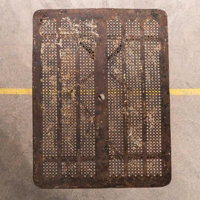 Good honest french metal dining table with a hand forged classic folding base and the original perforated sheet metal top....
