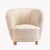 An original 1940's design from Denmark, this rounded tub chair is newly upholstered in a light cream boucle fabric with...