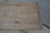 A beautifully rustic console table crafted from solid pinewood, dating to the first half of the 20th century. The long,...