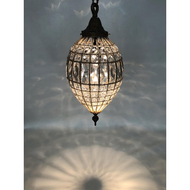 Antique Bronze Chandelier with Glass Drops. Empire Style, 1980s Magnificent Empire-style chandelier from the 1980s....