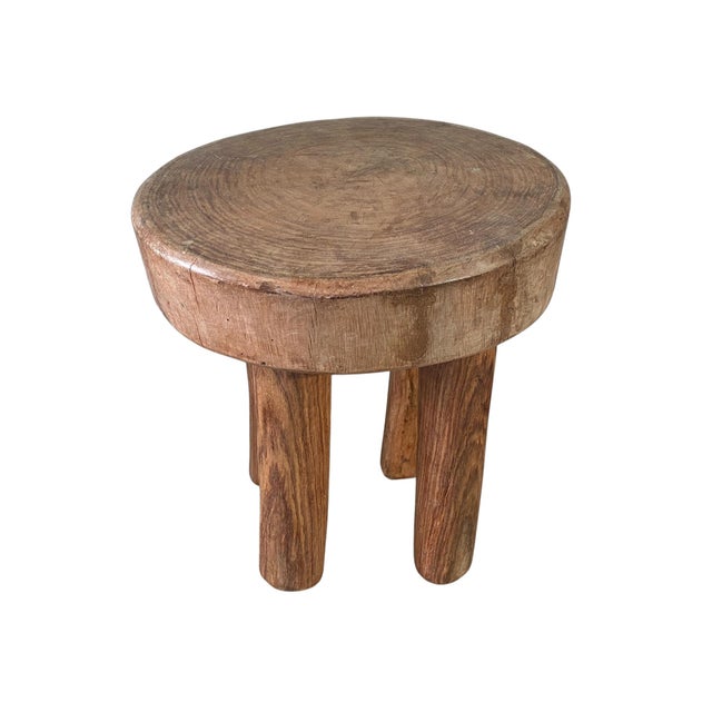 This remarkable vintage African milk stool is hand carved form one piece of wood by the Hehe Gogo people of Tanzania....