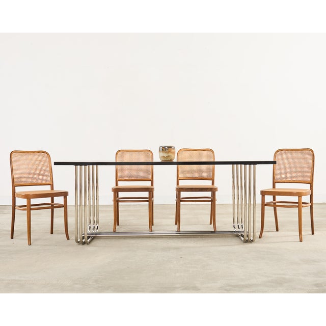 A refined set of six matching bentwood armchairs designed by Josef Hoffman for Thonet, known as the Model '811' Prague...