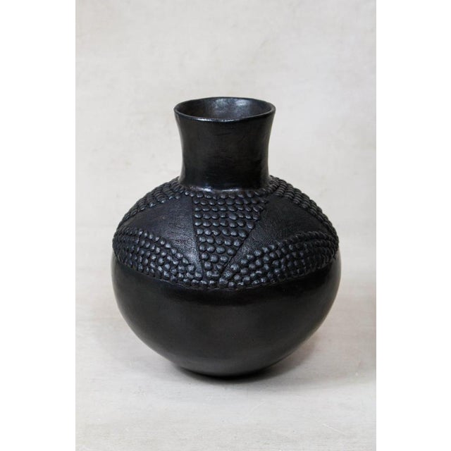 The Zulu pot, originating from South Africa, holds a distinguished role in the traditional practices of the Zulu people,...