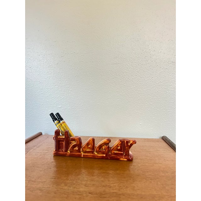 Ceramic pen homer for a desk by Royal Haeger Height: 2 7/8 in Width: 9 in Special Characteristics: BROWN/YELLOW