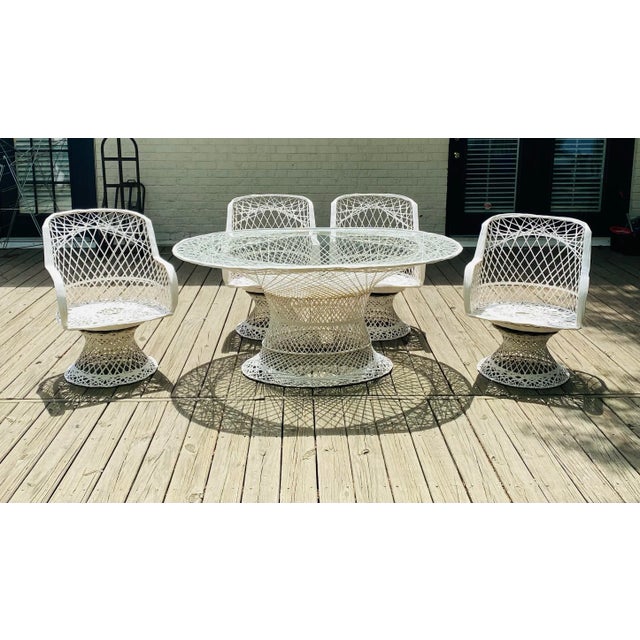 1970’s Russell Woodard Style Spun Fiberglass Oval Table W/ 4 Arm Chairs Typical condition for age. No cracks, chips, or...
