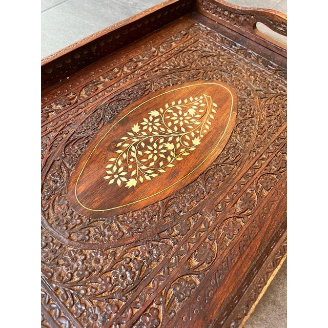 Old wood tray, with decorative carvings in the middle, insert work, with handles.