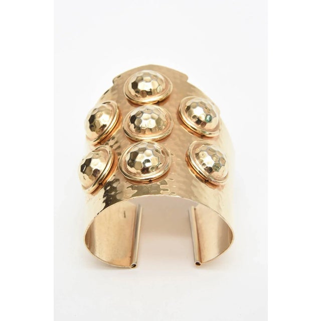 This is part of Chairish’s Costume Jewelry assortment. This arresting vintage hand hammered wide and sculptural vintage...