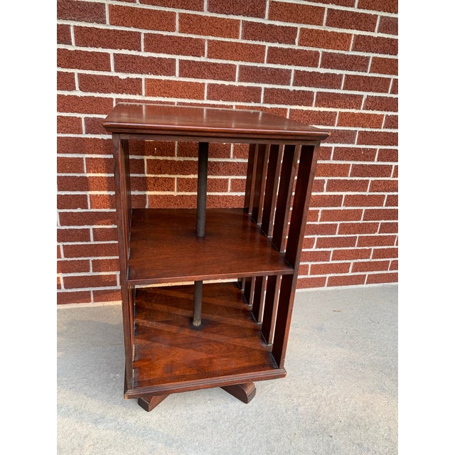 Nice revolving bookcase has a Mission or Arts and Crafts style to it but also Antique Victorian with the style and dark...