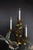 Hollywood Regency gilt tole wall sconce, circa 1970s. Romantic three-arm wall candle sconce crafted in gilt tole metal,...