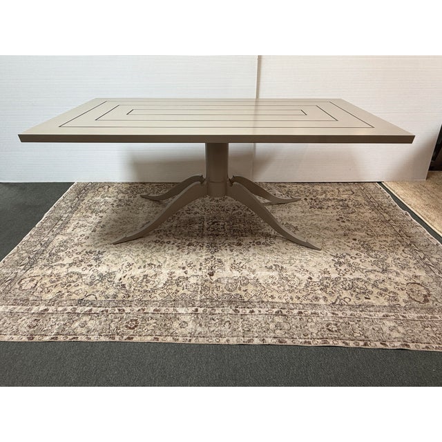 Design Plus Gallery presents the Outdoor Lipscomb Dining Table Base with Adams Style Top by McKinnon & Harris. The table...