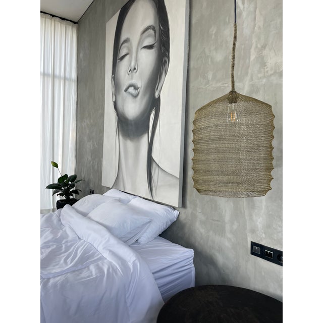 A bewitching minimalistic handcrafted knitted lamp for a stylish interior. The product is handmade from stainless wire and...