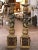 An exceptional pair of antique French carved and painted pedestals, richly decorated with grapevines, foliage, fruit...