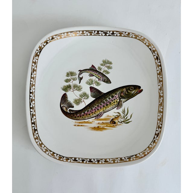 These vibrant square ceramic plates with turned up corners were made by Longchamp from the 1950s to 1960s and feature...