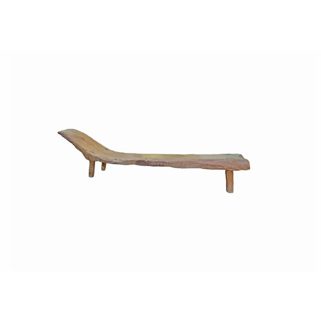 This hand-crafted teak wood low bench originates from the Island of Madura, off the coast of Northeastern Java. Its...