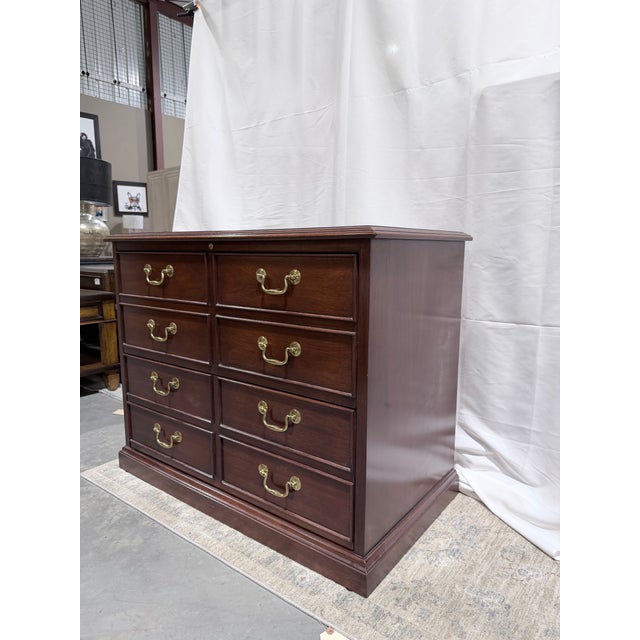 A finely crafted Sligh file cabinet chest executed in rich mahogany with a timeless traditional silhouette. This handsome...