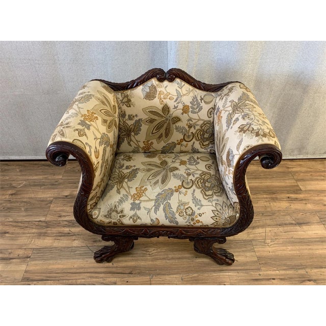 Antique American Empire Neoclassical Armchair. Wood is mahogany. Solid, good condition. Claw feet. Floral fabric is in...
