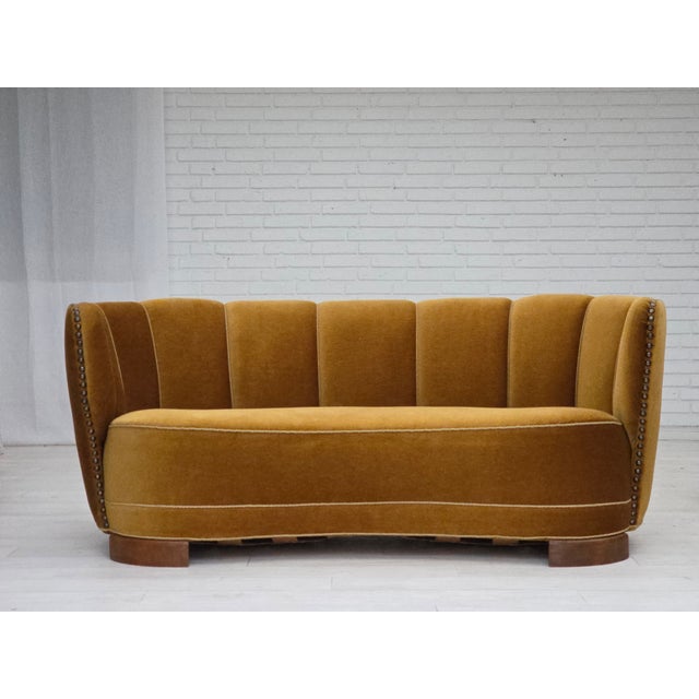 1960s, 2-seater Danish "Banana" sofa. Original olive/green furniture velour, oak wood legs, brass springs in the seat....