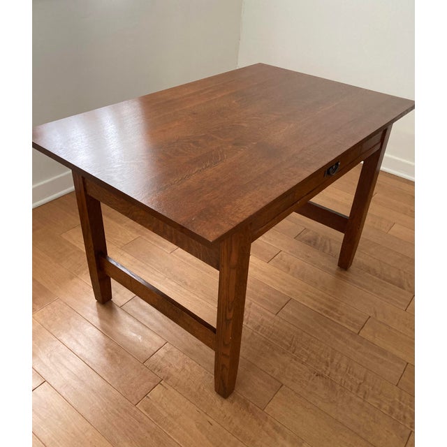 This is a reissue of the 1905 Stickley Gus Library Table that perfectly blends classic Arts & Crafts heritage with a...