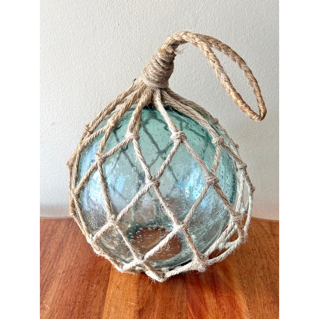 Mid 20th Century Authentic Hand Blown Blue Glass Fishing Float Buoy in Rope For Sale - Image 4 of 4