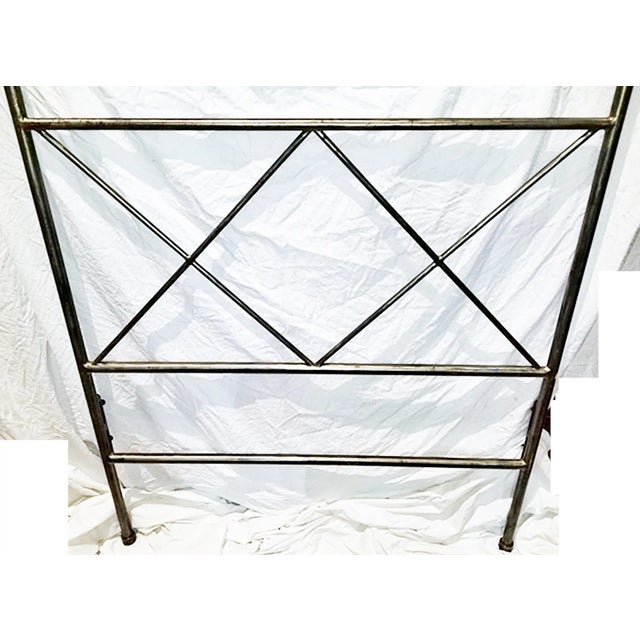 Twin size polished steel 2-poster headboard in a polished pewter and slight oxidation finish to mount to your wall or use...