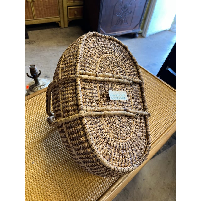 Vintage Handwoven African / Moroccan Style Oval Raffia Basket With Center Cross Handle For Sale In West Palm - Image 6 of 8