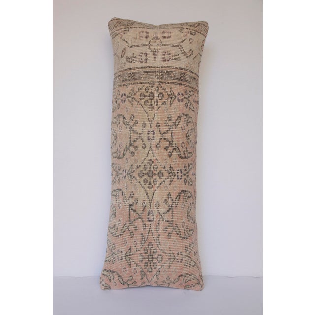 This vintage rug pillow cover offers a modern yet comfortable accent for contemporary interiors. Handcrafted from an...