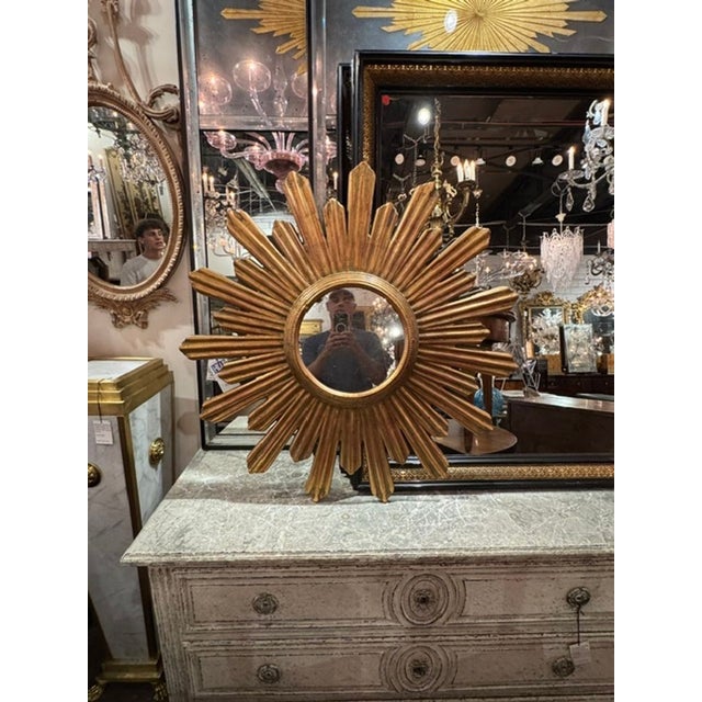 The Italian Carved and Giltwood Sunburst Mirrors are an elegant pair of a sophisticated space. Beautiful craftsmanship....