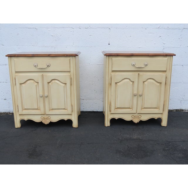 This beautiful Pair of Nightstands is made of wood, solid wood, and metal. These two high quality end tables was made by...
