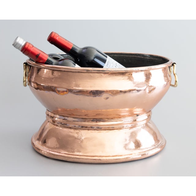 A superb large 19th Century French copper oval wine cooler or champagne ice bucket, also known as a rafraîchissoir, from...