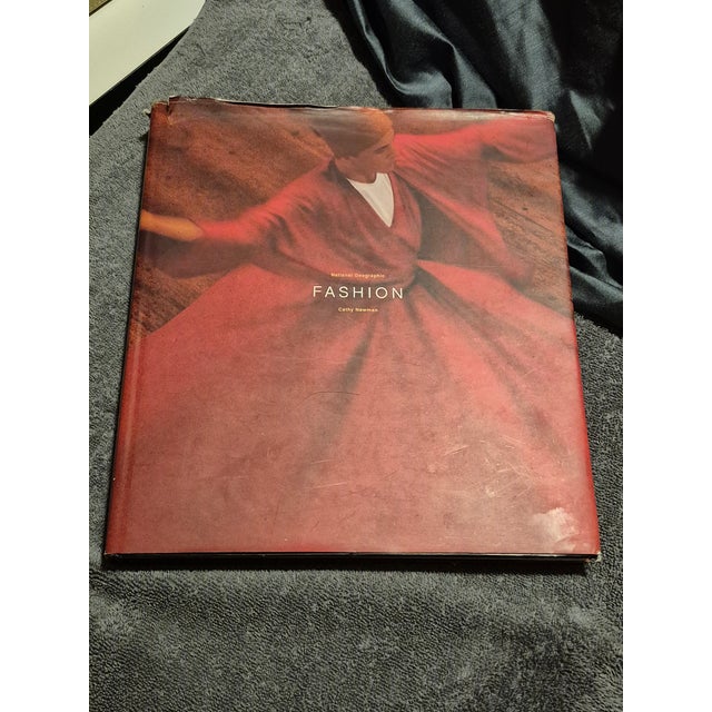Printed in Italy, over 200 National Geographic photos. Large size coffee table book. Dust cover edge wear but no real...